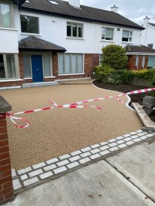New front garden with resin driveway paving and landscaping